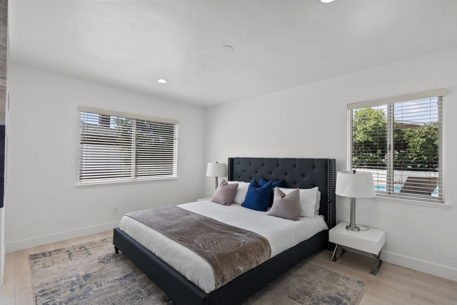 spacious bedroom with furniture staging at 9651 oso ave in chatsworth ca